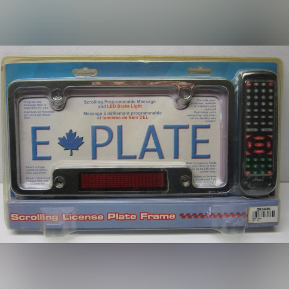 SCROLLING LICENSE PLATE FRAME new sealed in package w/ remote control unit